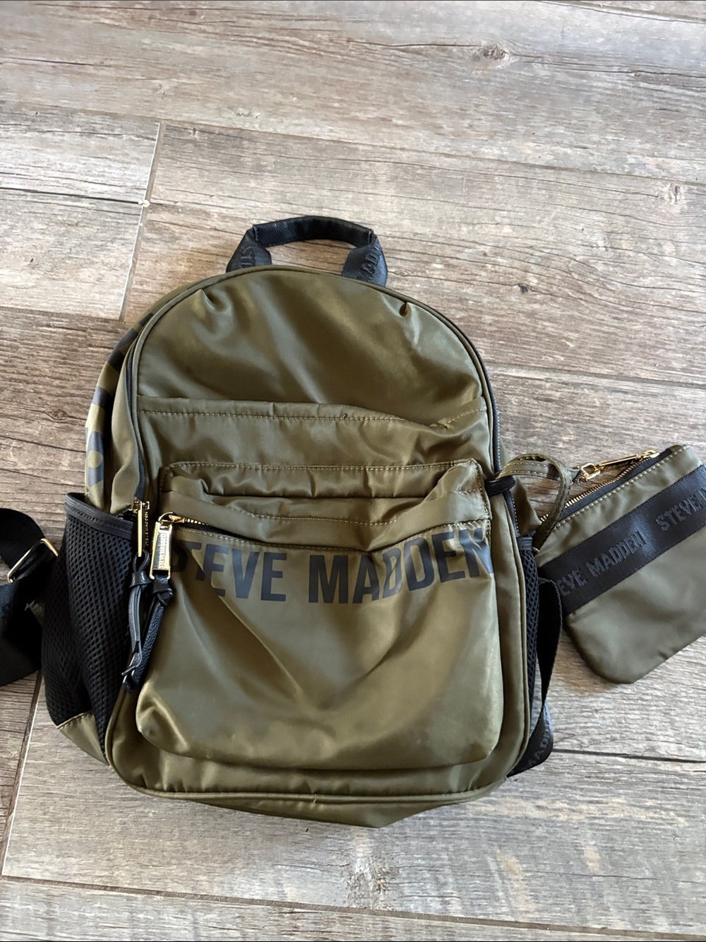 Steve Madden olive green backpack with matching wristlet